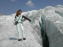 Franziska Baumann on the Rhone Glacier (Switzerland) recording the sounds of glacier activity for use in her work Gletschergesänge (Ice Songs).